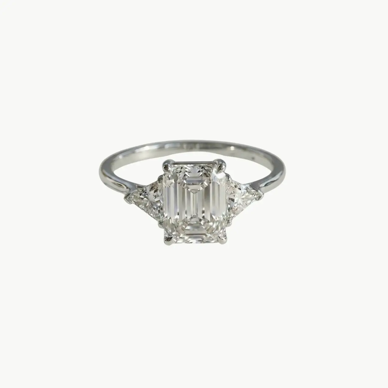Diamond Emerald Trilogy Trillion Engagement Ring