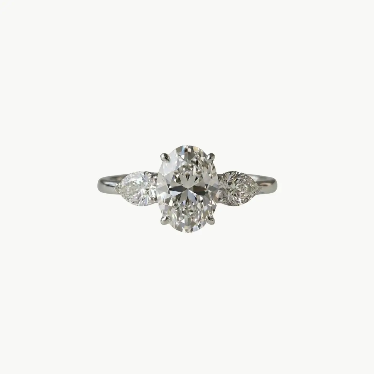 Diamond Oval Trilogy Pear Engagement Ring